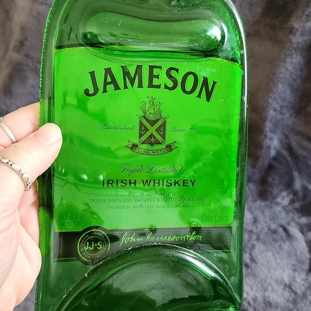 Flattened Jameson whiskey bottle